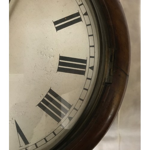 665 - A Railway clock with Fusee movement and Roman numerals in a mahogany case with glass front 38cms d.