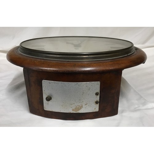 665 - A Railway clock with Fusee movement and Roman numerals in a mahogany case with glass front 38cms d.