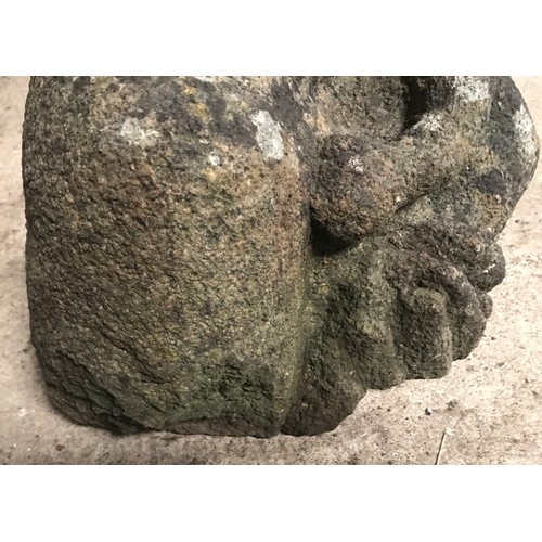 1320 - A stone figure of a man and child. Approx 35cms h x 30cms w.