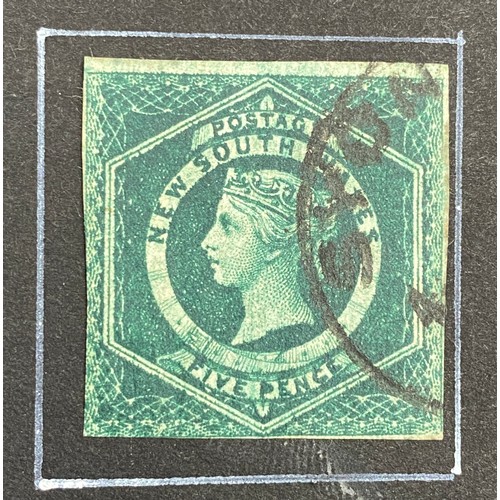 616 - A small album containing British and Commonwealth and a few assorted foreign stamps to include Great... 