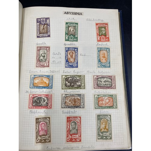 617 - Four albums of World stamps, two to include Abyssinia, Austria, Denmark,  Finland, Guatemala, Monaco... 