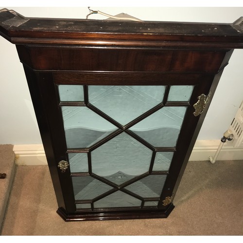 1198 - A good quality astral glazed single door hanging corner cupboard with decorative brass hinges. 94 h ... 