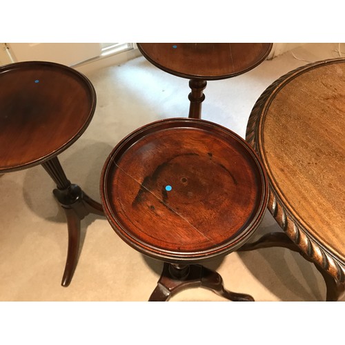 1206 - Four mahogany pedestal tables on tripod bases.