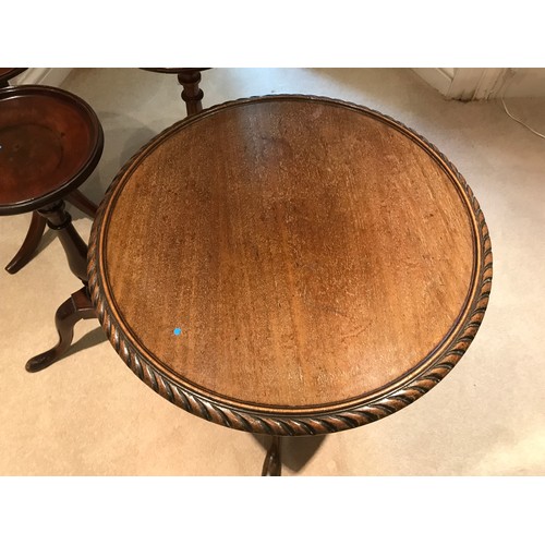 1206 - Four mahogany pedestal tables on tripod bases.