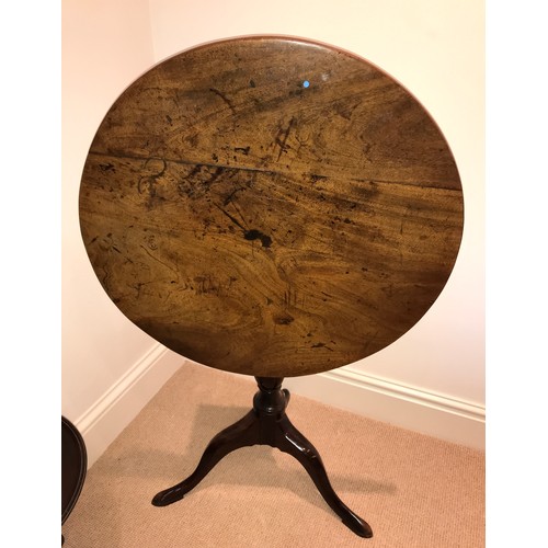 1207 - A 19thC mahogany tiptop tripod table. 67 d x 72cms h.