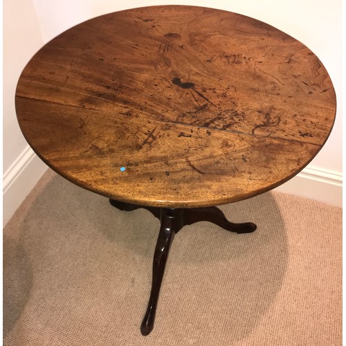 1207 - A 19thC mahogany tiptop tripod table. 67 d x 72cms h.