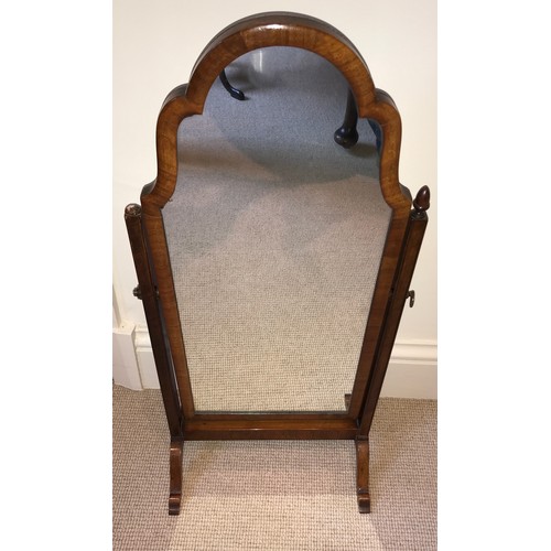 1209 - A walnut dressing table mirror.