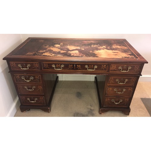 1210 - An Edwardian mahogany inlaid kneehole desk with garland and string inlay. 134 x 68 x 75cms h.