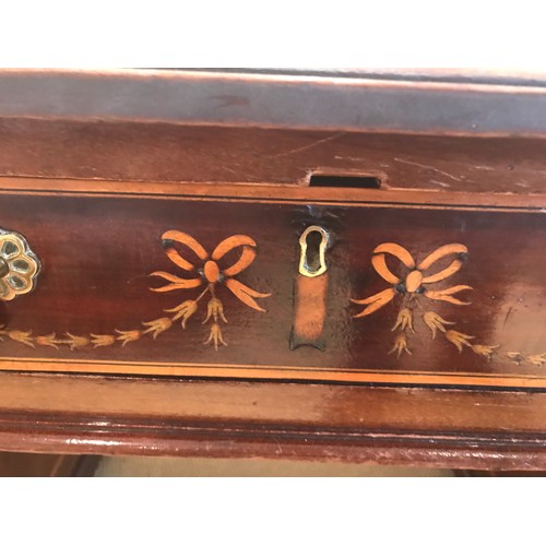 1210 - An Edwardian mahogany inlaid kneehole desk with garland and string inlay. 134 x 68 x 75cms h.