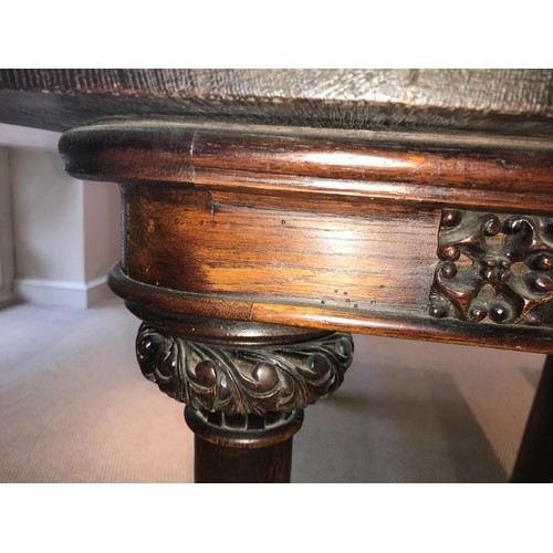 1211 - A 19thC oak table in two sections with carving to tops of legs. 159 x 137 x 71cms h.