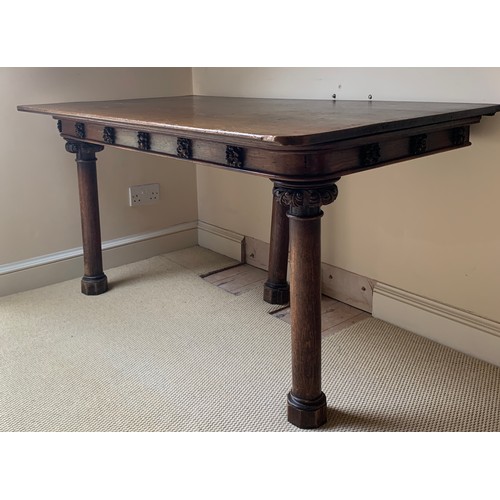 1211 - A 19thC oak table in two sections with carving to tops of legs. 159 x 137 x 71cms h.