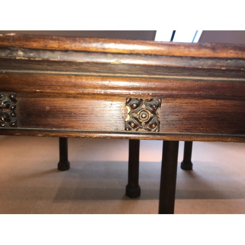 1211 - A 19thC oak table in two sections with carving to tops of legs. 159 x 137 x 71cms h.