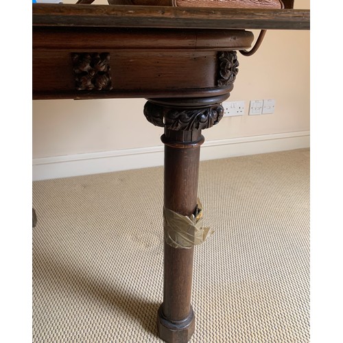 1211 - A 19thC oak table in two sections with carving to tops of legs. 159 x 137 x 71cms h.