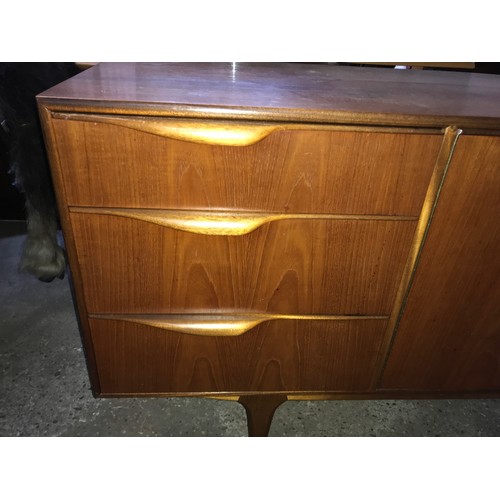 1190 - McIntosh retro teak sideboard, three drawers and two doors. 152 w x 45 d x 76cms h.