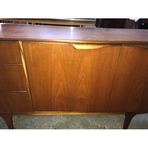 1190 - McIntosh retro teak sideboard, three drawers and two doors. 152 w x 45 d x 76cms h.