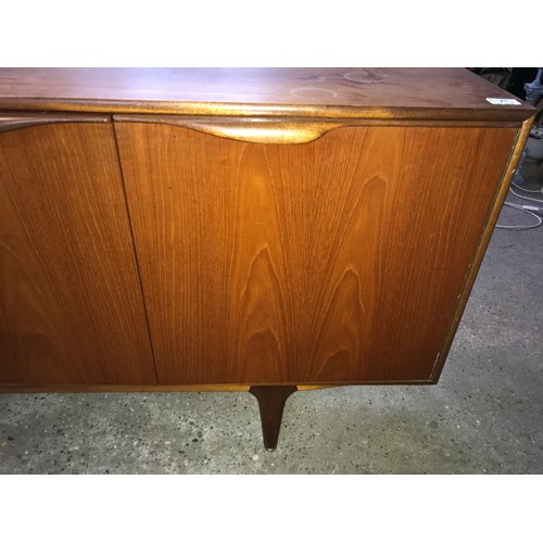 1190 - McIntosh retro teak sideboard, three drawers and two doors. 152 w x 45 d x 76cms h.