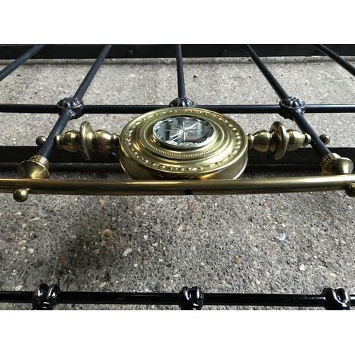 1196 - A Victorian brass and iron double bed with decorative central mirrored panel. 138cms w approx.