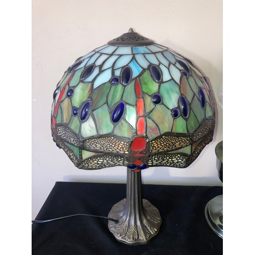 567 - A modern oil lamp and a table lamp with Tiffany style dragonfly shade. Oil lamp 60cms h.