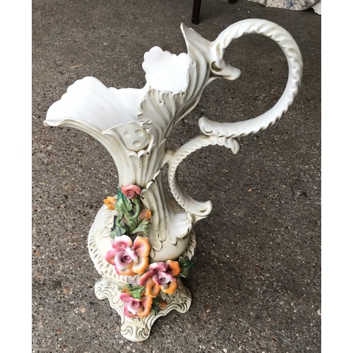 123 - A large Capodimonte jug vase. 68cms h.