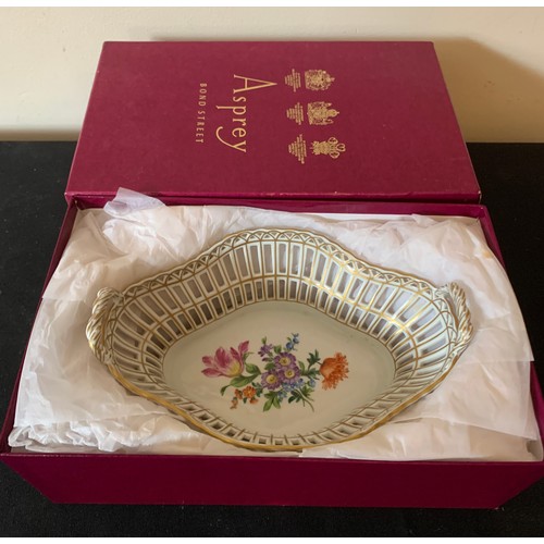 85 - A Dresden basket with gilt and floral decoration in original Asprey box. 21cms w.