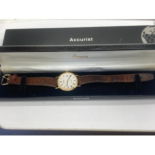 654 - An Accurist Gold 9ct gold gentleman's wristwatch with Roman numerals. 33mm case.