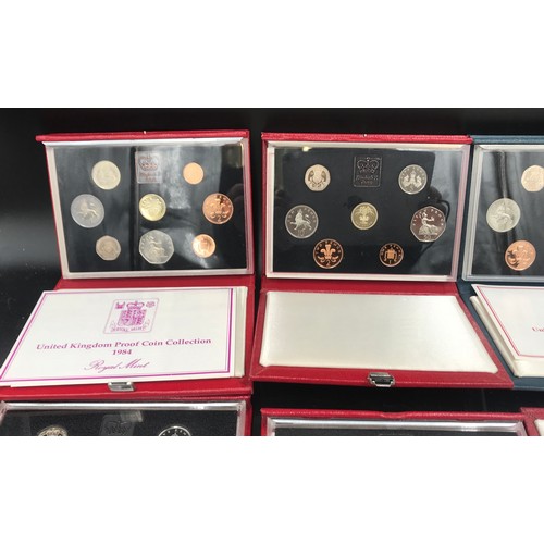 625 - A collection of Royal Mint UK cased proof coin sets, 1984,1985,1986 x 2, 1987 and 1988.