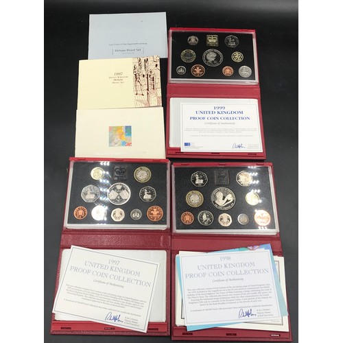 628 - Three Royal Mint UK Proof Coin sets to include 1997 with Prince Philip and Queen Elizabeth Wedding, ... 