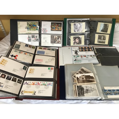 630 - A collection of six albums containing Royal Mail first day covers, envelopes, cards and an album of ... 