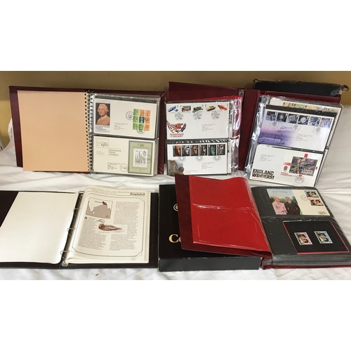 631 - Stanley Gibbons Collectors World Albums, three albums of First Day Covers and stamps including Jerse... 