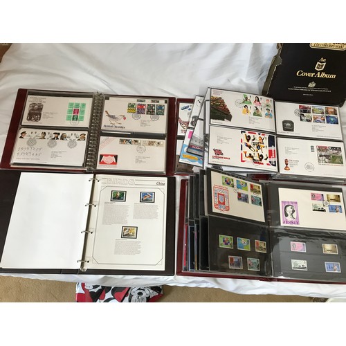 631 - Stanley Gibbons Collectors World Albums, three albums of First Day Covers and stamps including Jerse... 