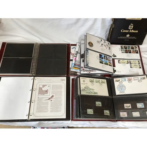 631 - Stanley Gibbons Collectors World Albums, three albums of First Day Covers and stamps including Jerse... 