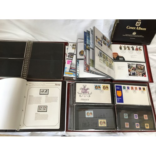 631 - Stanley Gibbons Collectors World Albums, three albums of First Day Covers and stamps including Jerse... 