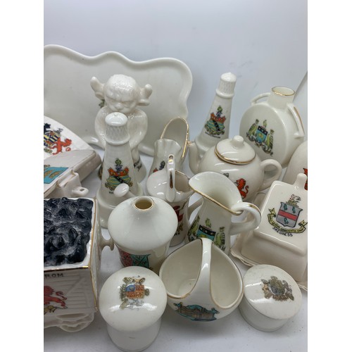 129 - A quantity of crested china to include Willow, Shelley, Corona etc. and to include Sandsend, Withern... 