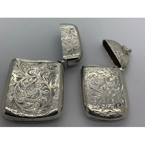 519 - Two silver vesta cases with foliate scroll engraving Chester 1898 maker William Aitken and Chester 1... 