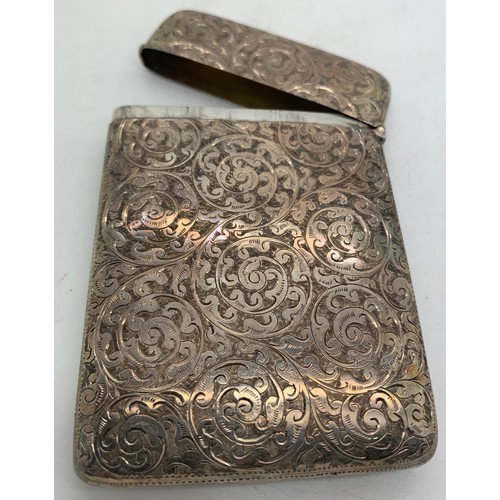 536 - A silver card case Birmingham 1893 with foliate scroll engraving. Initialled to front. 69gms.