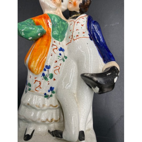 78 - Seven Staffordshire Figurines to include two flat backs. Tallest 32cms, smallest 16cms. All a/f.