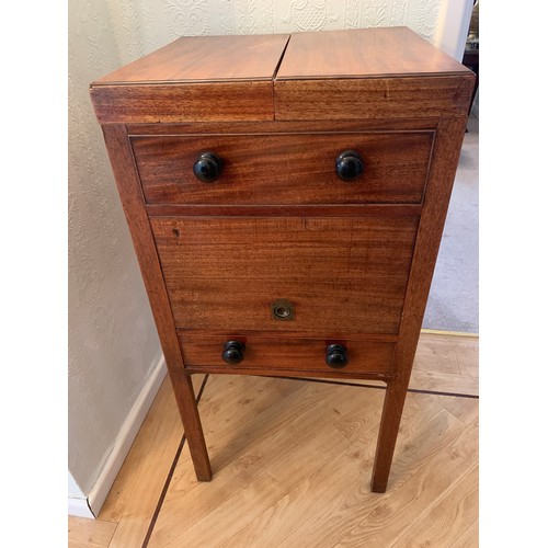 1226 - A Georgian mahogany wash stand opening to reveal partitions 45cms w x 43cms d x 94cms h.