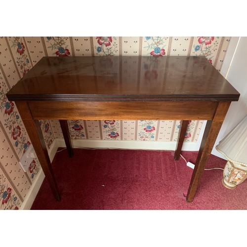 1231 - A 19thC fold over mahogany tea table. 85cms w x 41cms d x 74cms h.