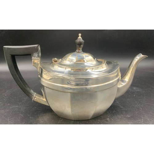 527 - Silver teapot with ebony handle & knop. Chester 1928. 590gms.