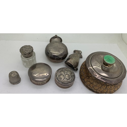 529 - Silver to include scent bottle case, Birmingham 1912, lidded pots, thimble etc, various dates and ma... 