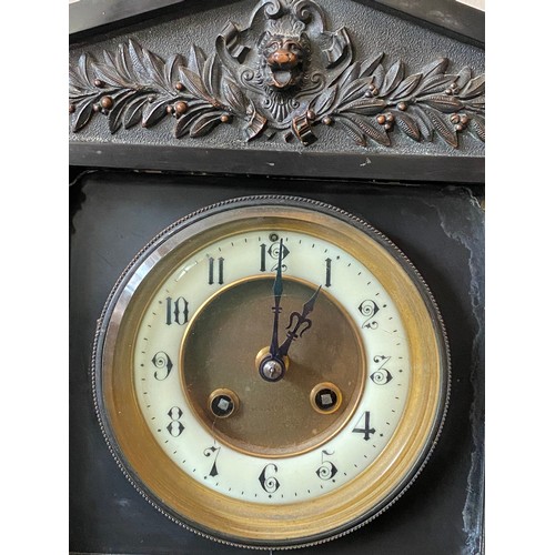 655 - A 19thC black slate mantle clock with six Corinthian columns to the front and a white enamelled chap... 