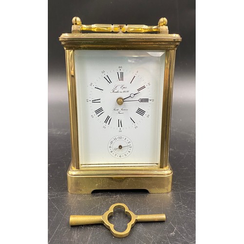 656 - A carriage clock with repeater movement and alarm with L'Epee Saint Suzanne France to face.  Stamped... 