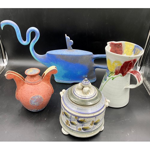 68 - Four items of studio pottery, all with impressed marks to include 2 unusual teapots one blue 59cms w... 