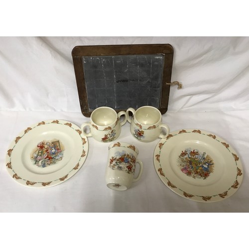 72 - Royal Doulton Bunnykins collection, two plates 20cms w, two twin handle mugs 7cms h, one beaker mug ... 