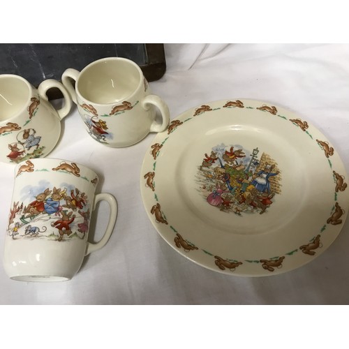 72 - Royal Doulton Bunnykins collection, two plates 20cms w, two twin handle mugs 7cms h, one beaker mug ... 