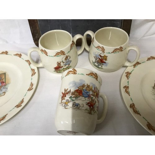 72 - Royal Doulton Bunnykins collection, two plates 20cms w, two twin handle mugs 7cms h, one beaker mug ... 