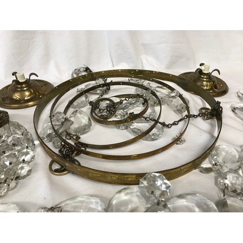 557 - Two glass droplet chandelier light fittings, one small French approx 12.5cms w and one 4 tier circul... 