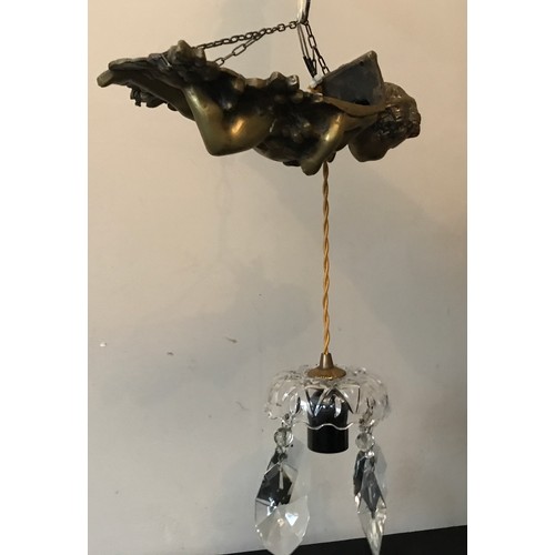 558 - Brass hanging ceiling light, cherub suspended on chain with glass droplet fittings, cherub approx 29... 