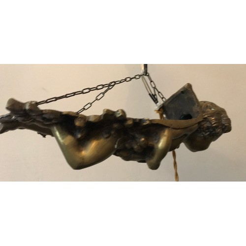 558 - Brass hanging ceiling light, cherub suspended on chain with glass droplet fittings, cherub approx 29... 