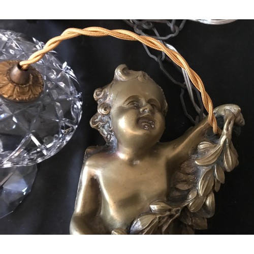 558 - Brass hanging ceiling light, cherub suspended on chain with glass droplet fittings, cherub approx 29... 